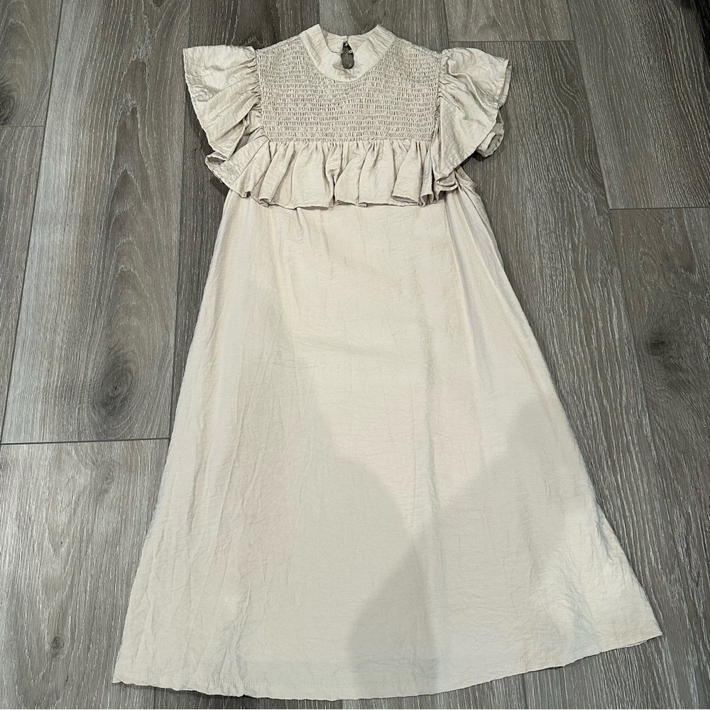 Elegant Cream Dress with Ruffle Detail